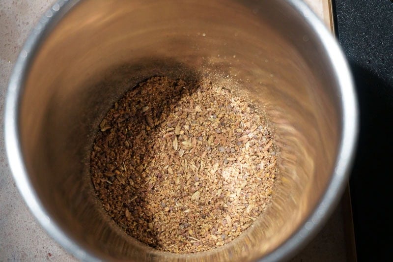Ground spices in a mortar.